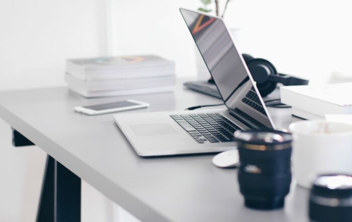 Free Gray Laptop on Table Top Stock Photo