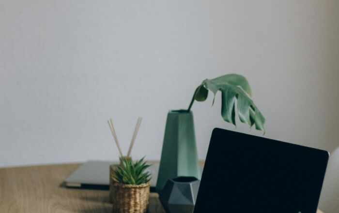 Free Black Laptop Computer On Brown Wooden Table Stock Photo