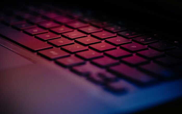 a-close-up-of-a-keyboard-with-a-blurry-background